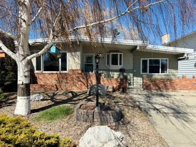 1519 16 Avenue S, Home with 4 bedrooms, 2 bathrooms and 5 parking in Lethbridge AB | Image 1