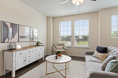 Living room with dark hardwood / wood-style floors and ceiling fan | Image 3