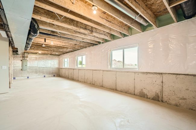 Photo is of the model. Look-out windows in the unfinished lower level. | Image 20