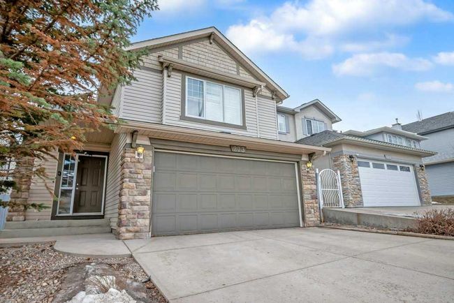 273 Panatella Boulevard Nw, Home with 3 bedrooms, 3 bathrooms and 4 parking in Calgary AB | Image 1