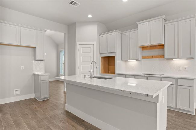 This photo is for illustrative purposes only and is not to be considered an exact replica of the finished home. Rendering does not match the finished product in terms of features, colors, landscaping, etc. Pricing, specifications, square footage and materials are subject to change at any time and without notice. | Image 9