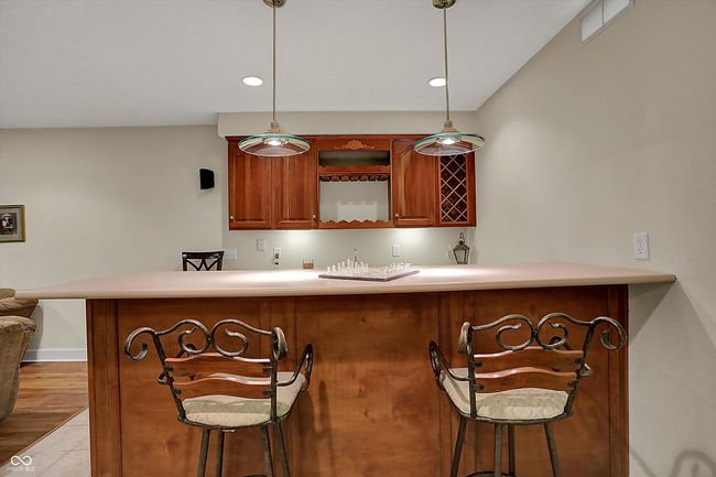 Wet Bar with Mini Fridge. | Image 53