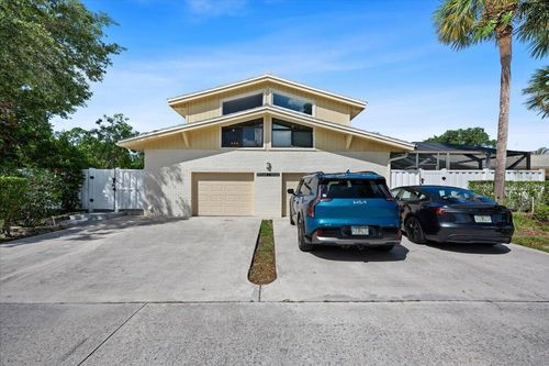 12556 Woodmill Dr, Palm Beach Gardens, FL, 33418-8933 | Card Image