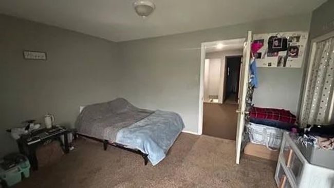 Bedroom featuring carpet floors | Image 18