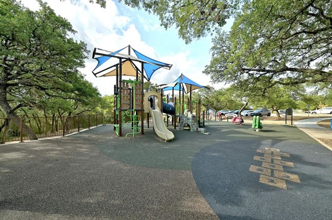 Community playground featuring fence | Image 32