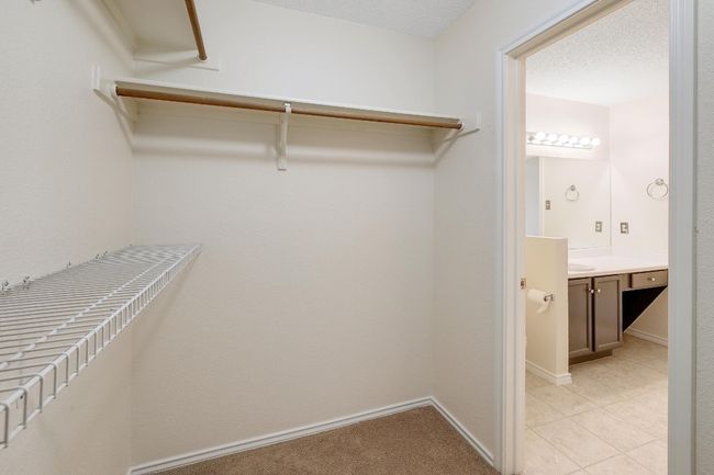 View of walk in closet | Image 18