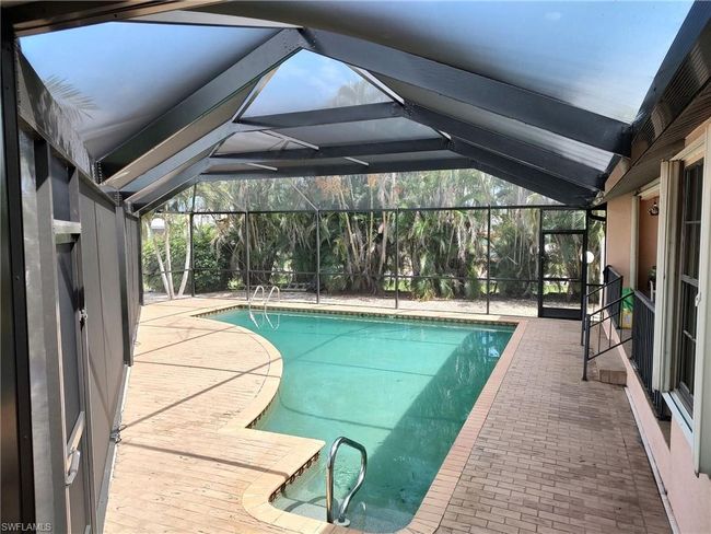 12321 Moon Shell Dr, House other with 3 bedrooms, 3 bathrooms and 2 parking in MATLACHA ISLES FL | Image 18