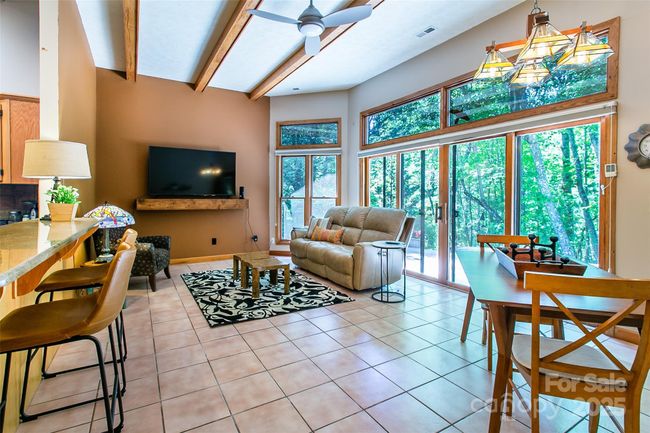 This cozy den is just the right spot for TV or games while dinner is being prepared | Image 10