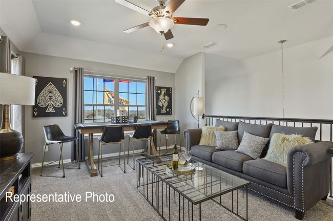 Carpeted living room featuring recessed lighting, visible vents, a ceiling fan, and baseboards | Image 13