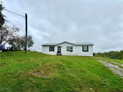 7710 Scroggs Road, House other with 3 bedrooms, 2 bathrooms and null parking in Lisbon OH | Image 1