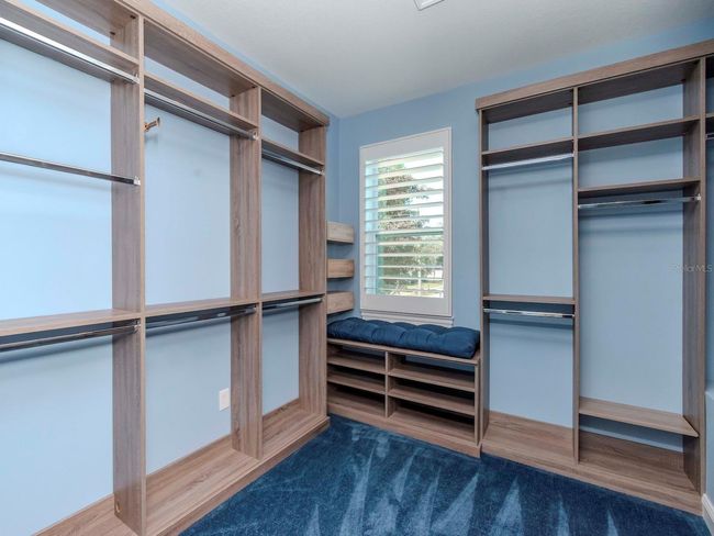 MASTER WALK IN CLOSET #1 WITH CUSTOM SHELVING | Image 23