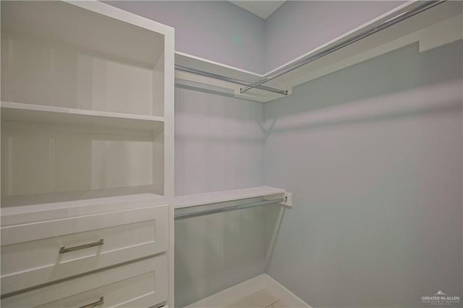 View of spacious closet | Image 18
