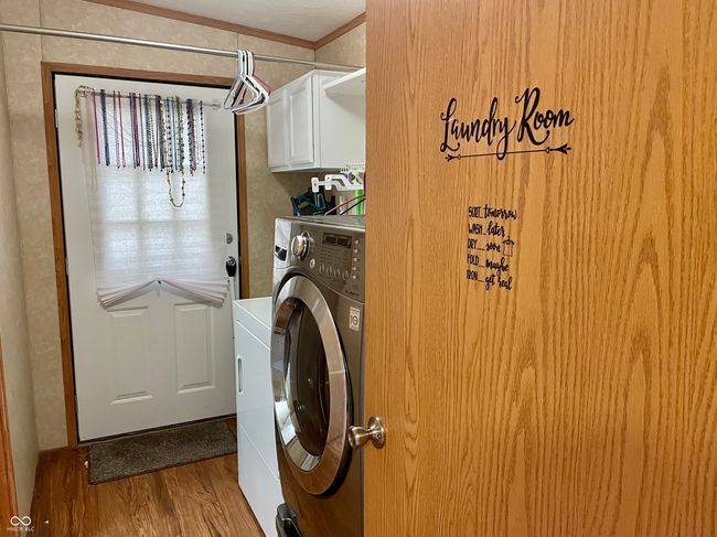side door leading out to the back deck | Image 17