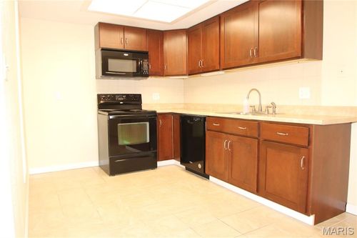 106-1400 Heritage Landing #106 Landing, St Charles, MO, 63303 | Card Image