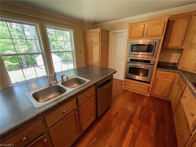 8004 Smithstone Ct, House other with 3 bedrooms, 2 bathrooms and null parking in Summerfield NC | Image 8