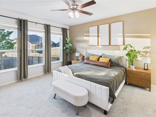Bedroom with carpet flooring, baseboards, and ceiling fan | Image 21