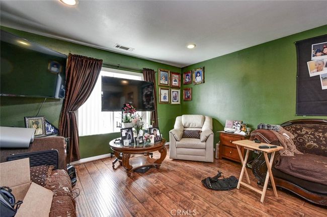 Livingroom 14360 1/2 Merced - hardwood floors, recessed lights | Image 6