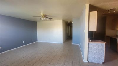 Unfurnished room featuring ceiling fan | Image 3