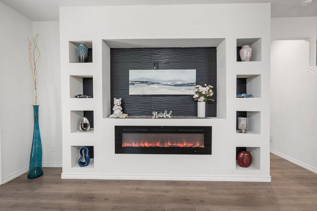 Built-In Entertainment Console with Display Shelves and Fireplace | Image 15