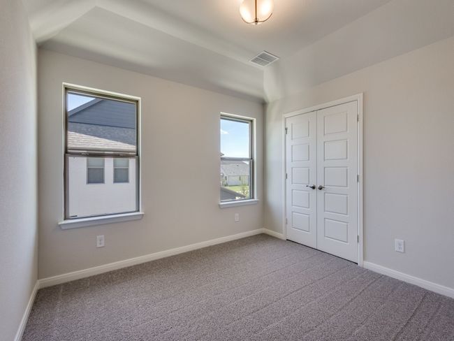 One of two nicely sized secondary bedrooms in our 3202 floor plan. | Image 14