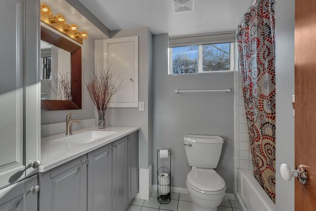 Newly updated bathroom, adding extra storage, too. | Image 11