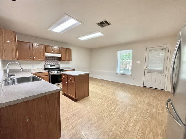 12005 Kilmartin Ln, House other with 3 bedrooms, 2 bathrooms and null parking in Austin TX | Image 4
