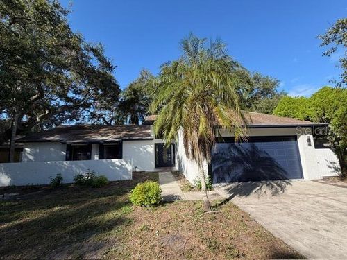 933 Woodland Dr, PALM HARBOR, FL, 34683-6658 | Card Image