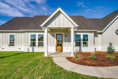 View of front of home with a front lawn | Image 2