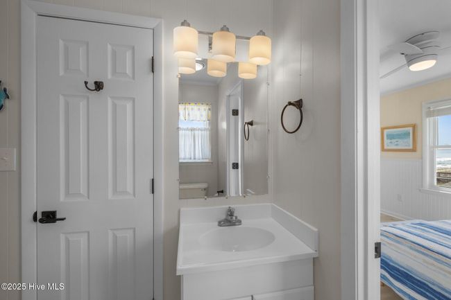 full bath accessible from bedroom and hall | Image 25