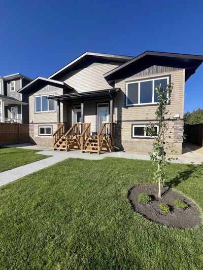 3-ANDAMP-4 - 5135 53 St, House other with 0 bedrooms, 0 bathrooms and 4 parking in Lacombe AB | Image 3