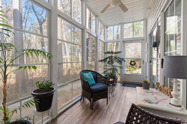 Sunroom / solarium with ceiling fan | Image 26
