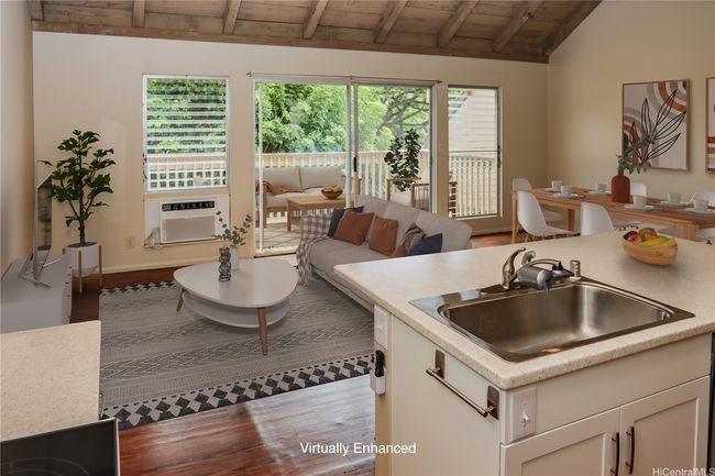 View from kitchen towards living room. Virtually enhanced with furniture. | Image 5