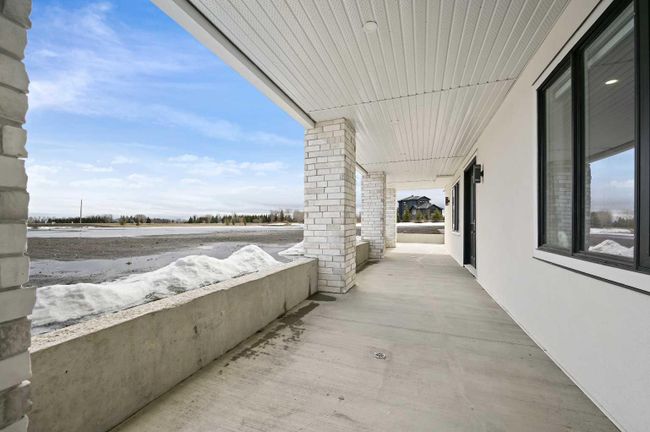 35 Windhorse Green, Home with 8 bedrooms, 6 bathrooms and 20 parking in Rural Rocky View County AB | Image 45