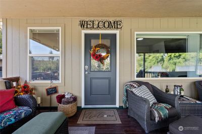 Welcome home to this 1925 cabin with wrap around porch, lakeview, fir floors, cozy and warm this is the place for gatherings! Bring the whole crew! | Image 3