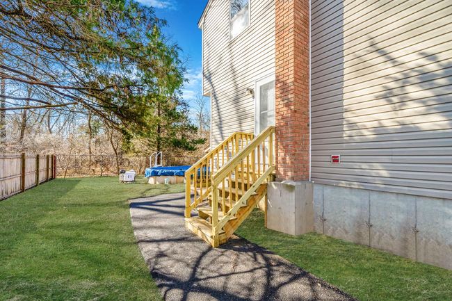 View of yard with a fenced backyard | Image 24