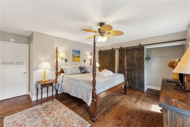 Large primary bedroom with spacious double closets, ample storage, and ensuite full bathroom. | Image 45