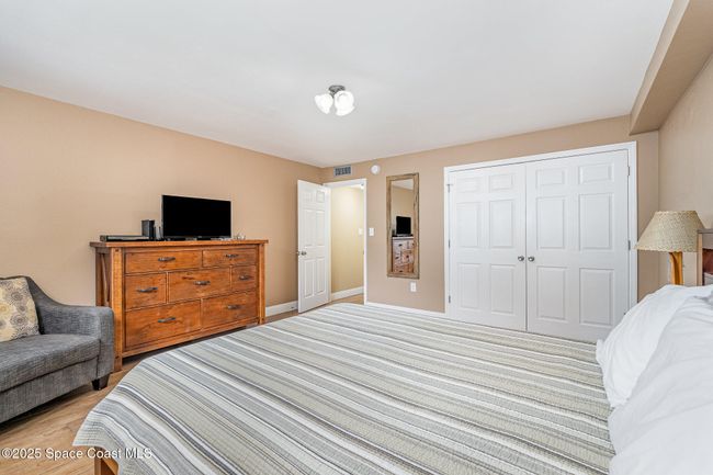 Upstairs East Bedroom with Peekaboo view of Ocean and Spacious closet | Image 25