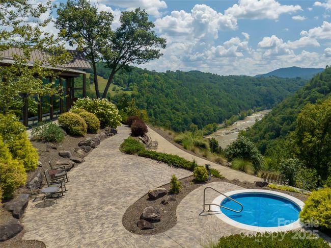Hot tub overlooking the French Broad River | Image 11