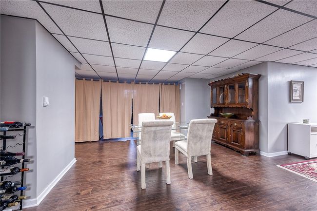 and dining area. Behind the curtains is ample space to turn into a bedroom. | Image 33