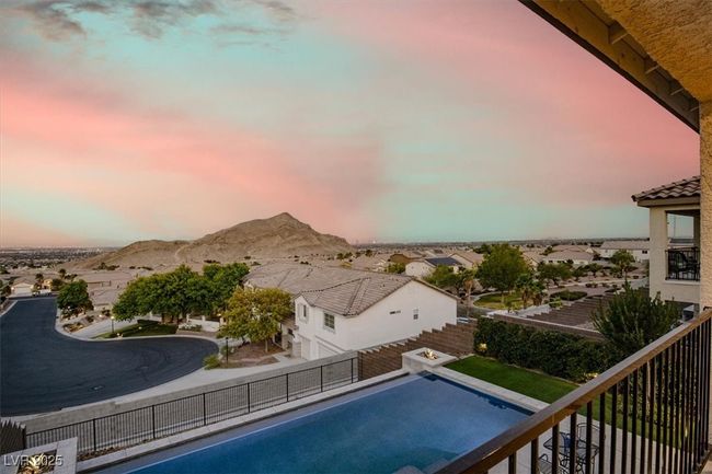 View of swimming pool with a mountain view and a residential view | Image 4