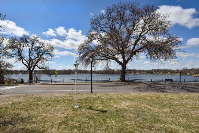 View of Crystal lake from front yard! Enjoy the Beautiful Westerly Sunset Views! | Image 12