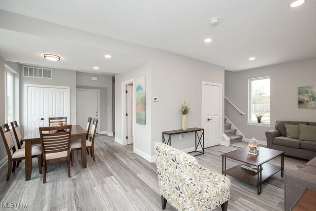 Living room featuring light hardwood / wood-style floors | Image 11