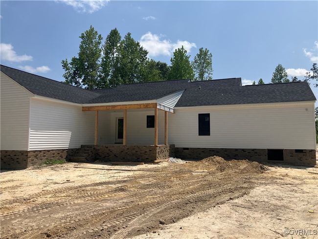 Back of property featuring crawl space and roof with shingles | Image 6