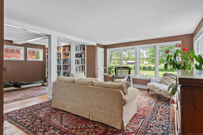 One step up, you have your own personal library nook. | Image 22