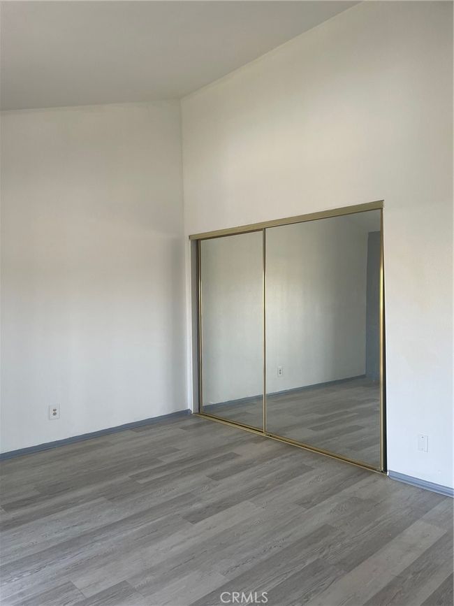 Bedroom view of mirror closet | Image 9