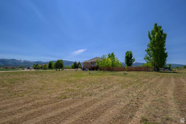 View of yard with a rural view and a mountain view | Image 39