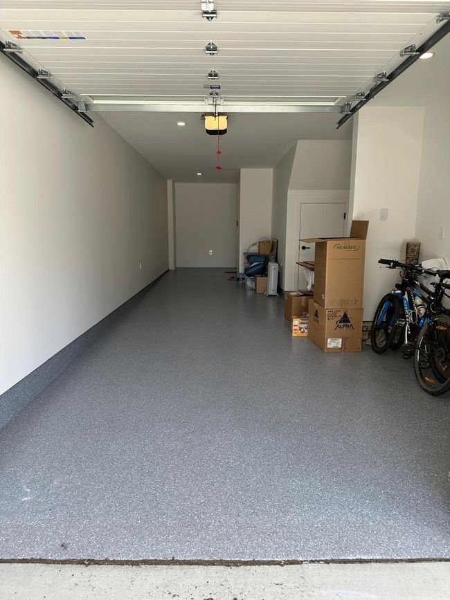 Garage with a garage door opener | Image 15