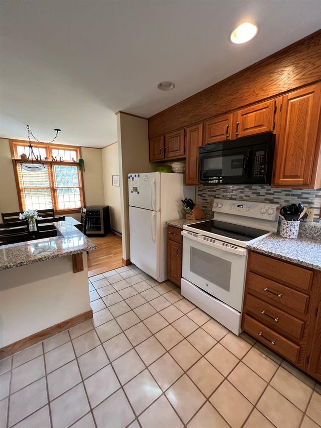 9 Mulligan Ct, Condo with 3 bedrooms, 2 bathrooms and null parking in Laconia NH | Image 5