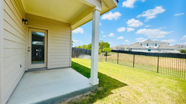 View of yard featuring a patio area and a residential view | Image 37