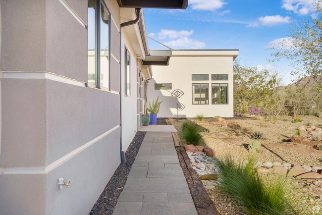 View of property exterior featuring stucco siding | Image 49